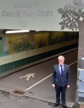 Cllr Mike Sutherland standing at the Beecroft Road car park entrance to the town centre