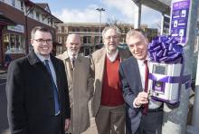 People standing next to Swift smart card reader People standing next to Swift smart card reader