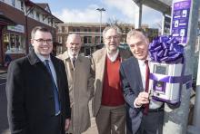 People standing next to Swift smart card reader