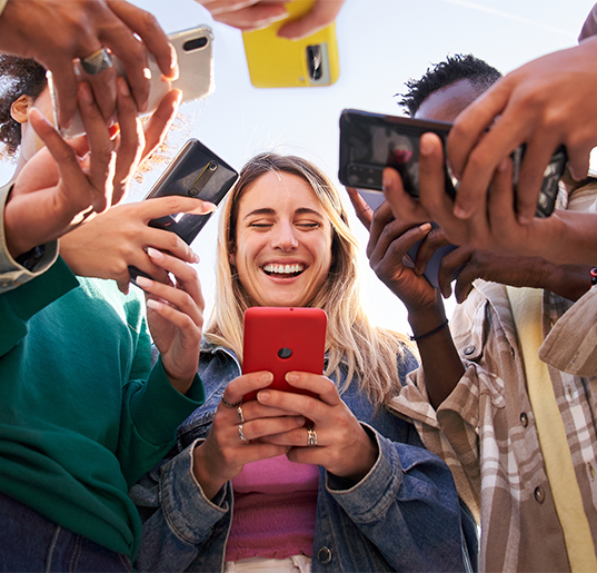 People using phones for social media