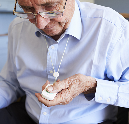 Man wearing a pendant alarm