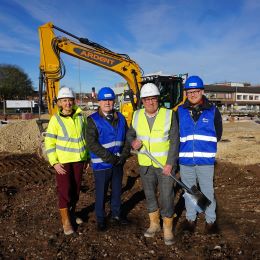 four people at ground breaking ceremony avon road car park