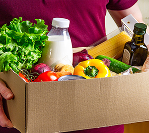 person holding a food box